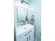 Bathroom featuring a vanity, mirror, modern lighting, and blue accent wall at 2031 Thornhill Dr, Summerville, SC 29485