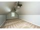 Upstairs bonus room featuring carpeting, a window, vaulted ceilings, and two ceiling fans at 2031 Thornhill Dr, Summerville, SC 29485