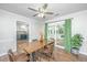 Well-lit dining room with a view of an outdoor screened deck at 2031 Thornhill Dr, Summerville, SC 29485