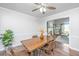 Cozy dining area with hardwood floors, stylish furniture, and natural light at 2031 Thornhill Dr, Summerville, SC 29485