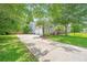 A front exterior shows the home with an attached two-car garage and long driveway at 2031 Thornhill Dr, Summerville, SC 29485