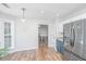 A brightly lit eat-in kitchen features granite countertops and stainless steel appliances at 2031 Thornhill Dr, Summerville, SC 29485