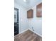 Mud room features wood-look flooring, hanging cabinets and an exterior door at 2031 Thornhill Dr, Summerville, SC 29485