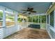 Enjoy this screened in porch complete with a porch swing overlooking the backyard at 2031 Thornhill Dr, Summerville, SC 29485