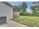 A well-maintained, green backyard with a wooden fence, perfect for outdoor activities and relaxation at 208 Kirkland St, Goose Creek, SC 29445