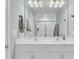 Bathroom featuring a double sink vanity with chrome fixtures and a large mirror at 208 Kirkland St, Goose Creek, SC 29445