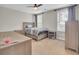 Bedroom features a neutral palette, ceiling fan, and plenty of natural light at 208 Kirkland St, Goose Creek, SC 29445