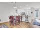 Modern kitchen and dining area with stainless steel appliances and a stylish bar at 208 Kirkland St, Goose Creek, SC 29445
