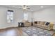 Cozy living area featuring hardwood floors, a ceiling fan, and access to the outdoors at 208 Kirkland St, Goose Creek, SC 29445