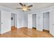 Bright bedroom boasts hardwood floors, ceiling fan, and spacious closets at 21 Rivers Point Row # 17G, Charleston, SC 29412