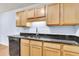 Kitchen featuring stainless steel sink, granite countertops, and modern dishwasher at 21 Rivers Point Row # 17G, Charleston, SC 29412