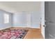 Bright living room with hardwood floors, a colorful rug, and plenty of natural light at 21 Rivers Point Row # 17G, Charleston, SC 29412