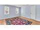 Comfortable living room featuring hardwood floors, natural light and a classic rug at 21 Rivers Point Row # 17G, Charleston, SC 29412