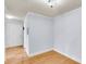 Clean living room with hardwood floors and a door, with views of an adjacent hallway at 21 Rivers Point Row # 17G, Charleston, SC 29412