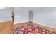Light-filled living room featuring hardwood floors, a colorful rug, and neutral paint at 21 Rivers Point Row # 17G, Charleston, SC 29412