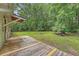 A spacious wooden back deck overlooking the lush backyard at 2202 Sc-61, Ridgeville, SC 29472