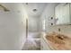 A bathroom featuring a toilet, bath tub, window, and large pink sink at 2202 Sc-61, Ridgeville, SC 29472