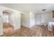 Bright kitchen boasting wood cabinets, laminate floors, and white appliances at 2202 Sc-61, Ridgeville, SC 29472