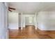 Spacious living room boasting hardwood floors and classic columns at 2202 Sc-61, Ridgeville, SC 29472