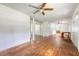 Inviting living room with white columns, hardwood floors, and an open layout with natural light at 2202 Sc-61, Ridgeville, SC 29472