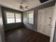 Small bedroom with a ceiling fan, hardwood floors, natural light, and a fresh coat of paint at 2204 Dover St, North Charleston, SC 29405