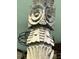 Close-up of an intricate owl post, likely part of a home's architectural or decorative elements at 2204 Dover St, North Charleston, SC 29405