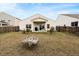 A fenced in backyard with a covered patio and a mostly dry lawn at 226 Clydesdale Cir, Summerville, SC 29486