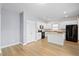 Bright, modern kitchen with white cabinets, granite countertops, and stainless steel appliances at 226 Clydesdale Cir, Summerville, SC 29486