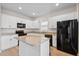 Well-lit kitchen with white cabinets, granite countertops, stainless steel appliances, and a center island at 226 Clydesdale Cir, Summerville, SC 29486