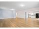 Open-concept living area featuring light wood floors, recessed lighting, and access to the kitchen at 226 Clydesdale Cir, Summerville, SC 29486