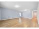 Bright, open living space with light wood floors, pale gray walls, and recessed lighting at 226 Clydesdale Cir, Summerville, SC 29486