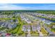 An aerial view of a picturesque neighborhood with homes and a winding pond system at 2336 Brinkley Rd, Johns Island, SC 29455