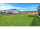 Large, well-maintained backyard with a lush green lawn perfect for outdoor activities at 2336 Brinkley Rd, Johns Island, SC 29455