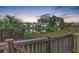 Idyllic backyard with a pond, framed by lush greenery, creating a serene outdoor space at 2336 Brinkley Rd, Johns Island, SC 29455