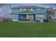 Spacious backyard with a covered patio, ideal for outdoor entertaining and relaxation at 2336 Brinkley Rd, Johns Island, SC 29455