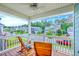 Relaxing balcony with two chairs offers a scenic view of the neighborhood at 2336 Brinkley Rd, Johns Island, SC 29455