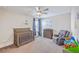 Cozy Bedroom with a crib, changing table, chair, and toys for a new baby at 2336 Brinkley Rd, Johns Island, SC 29455