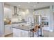 Well-equipped kitchen with granite countertops, stainless steel appliances, and breakfast bar seating at the island at 2336 Brinkley Rd, Johns Island, SC 29455