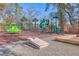 Community playground featuring slides, climbing structures, and a cornhole game for outdoor Gathering fun at 2336 Brinkley Rd, Johns Island, SC 29455