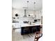 Contemporary kitchen with stainless steel appliances, a central island, and bar stool seating at 25 Nats Ct, Charleston, SC 29403