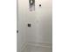 Small, unfinished laundry room with white walls and tile floors at 25 Nats Ct, Charleston, SC 29403