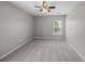 Bright and airy bedroom featuring a ceiling fan and a window with natural light at 251 Emerald Isle Dr, Moncks Corner, SC 29461