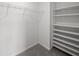Walk-in closet features shelving and a hanging rod for optimal storage and organization at 251 Emerald Isle Dr, Moncks Corner, SC 29461