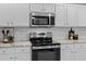 A close-up view of the kitchen appliances, countertops, and cabinets for a modern kitchen at 251 Emerald Isle Dr, Moncks Corner, SC 29461