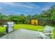 Enjoy outdoor grilling with this grill and patio seating area with a grass backyard at 254 Mayfield Dr, Goose Creek, SC 29445