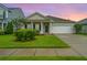 Charming single-story home featuring a well-manicured lawn and attached garage, perfect for suburban living at 254 Mayfield Dr, Goose Creek, SC 29445