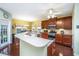 Charming kitchen with granite countertops, stainless appliances, and dark wood floors at 254 Mayfield Dr, Goose Creek, SC 29445