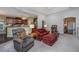 Open-concept living space with a view into the kitchen and comfortable seating at 254 Mayfield Dr, Goose Creek, SC 29445