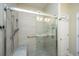 Handicap accessible shower with glass enclosure, shower seat, and safety bars at 254 Mayfield Dr, Goose Creek, SC 29445