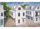 Charming three-story beach house with white siding, a small porch, and light-blue door at 26 Nats Ct, Charleston, SC 29403
